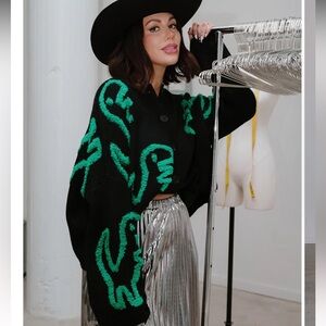Dressed in LALA Black and Green Dinosaur Sweater